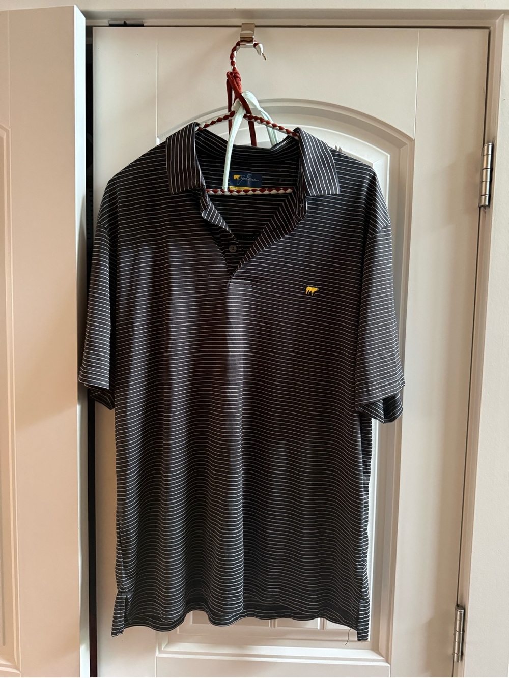 Men's Jack Nicklaus Black Striped Golf Polo Shirt with Yellow Bear Logo